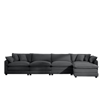 Dark gray modular sectional sofa with right chaise ottoman, low back, deep seat cushions