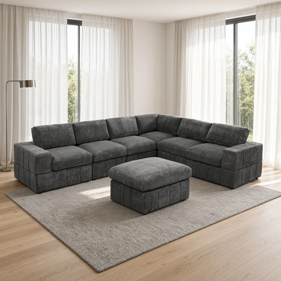 Dark gray L-shaped sectional sofa with matching square ottoman