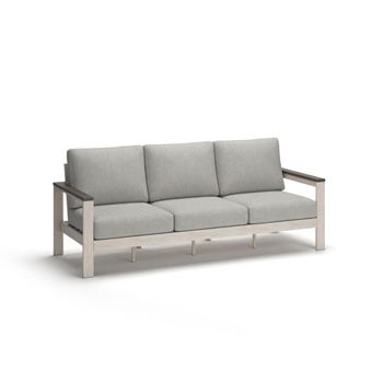 Three-seat sofa with light gray cushions, brown frame, and white side supports