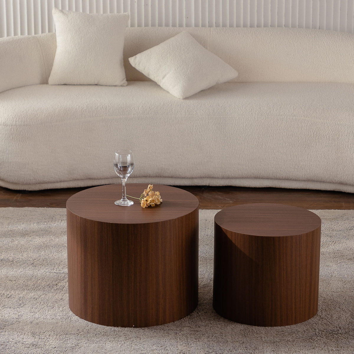 Set of 2 round nesting coffee tables, dark brown wood, featuring two tabletop surfaces