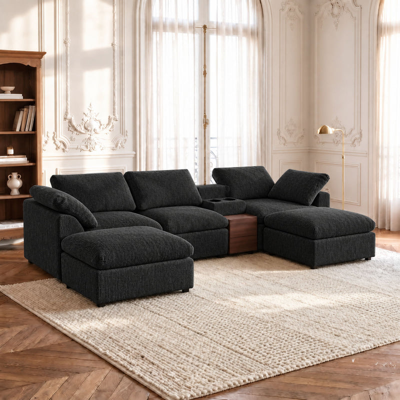 Black modular sectional sofa with storage console and chaise ottomans, square cushions