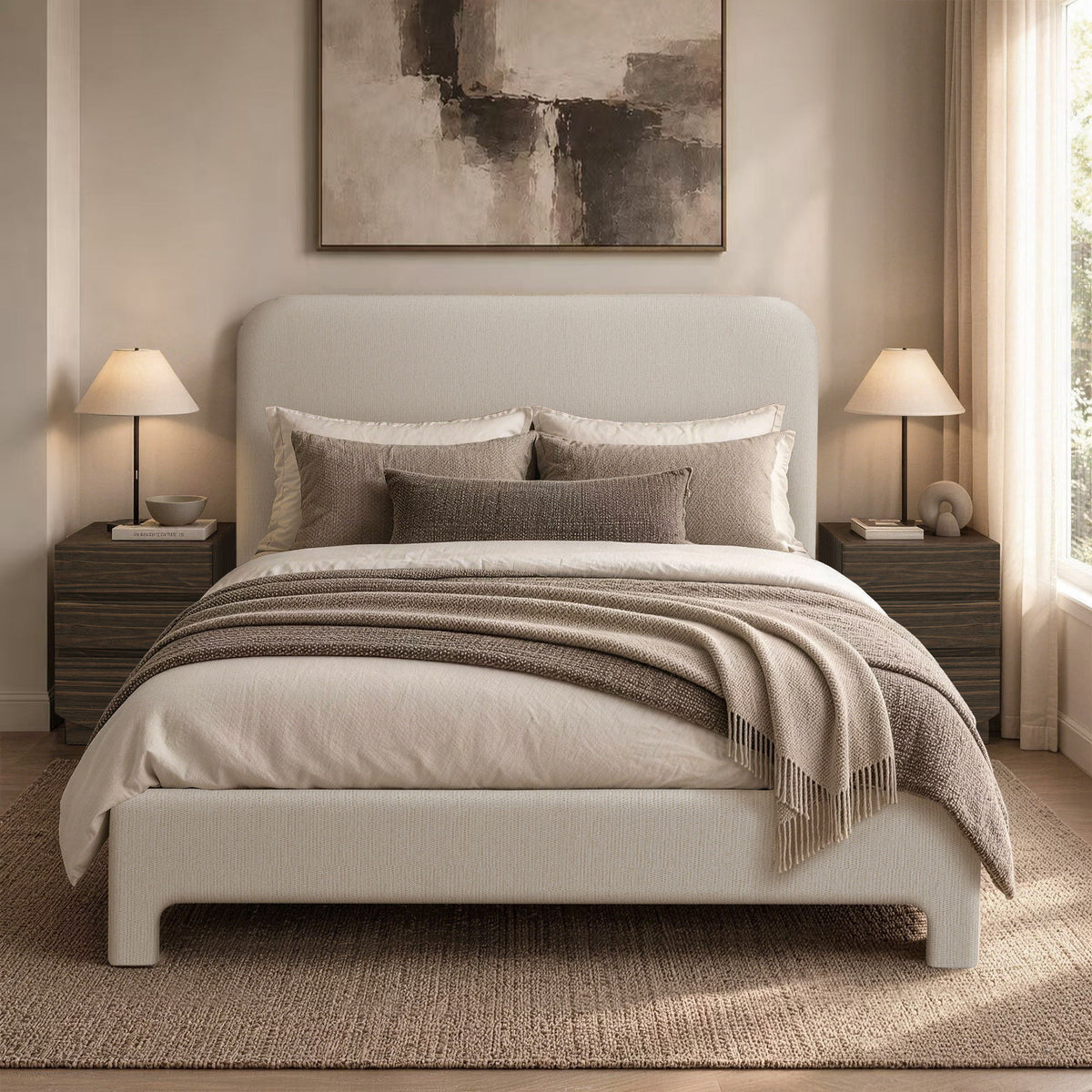 Light brown upholstered bed with pillows and layered bedding on slat base