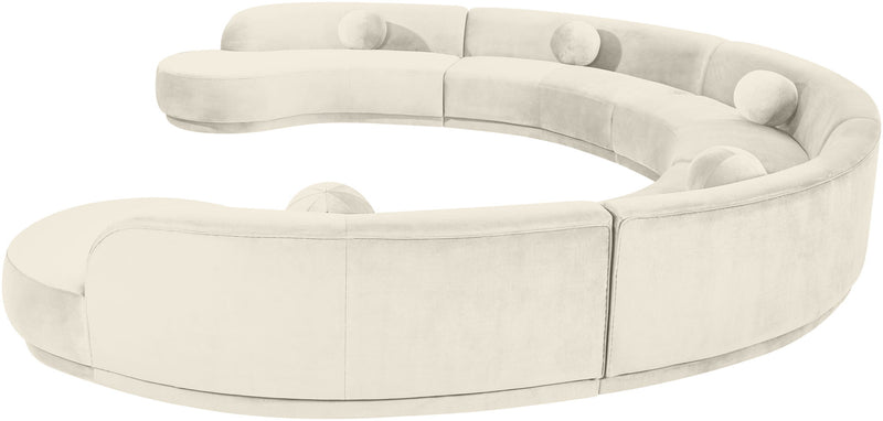 Beige performance velvet sectional sofa with rounded arms and tufted back cushions
