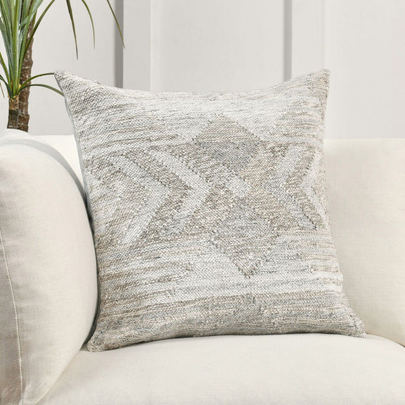 Gray multi woven decorative pillow with geometric pattern on sofa seat
