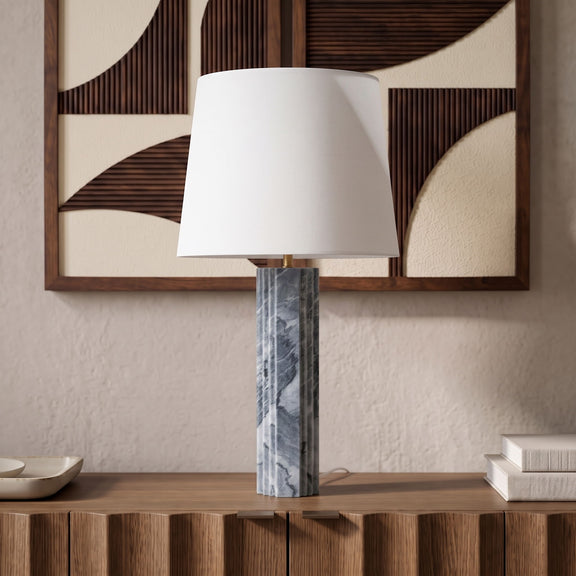 Table lamp with white fabric shade and blue-gray marbled base