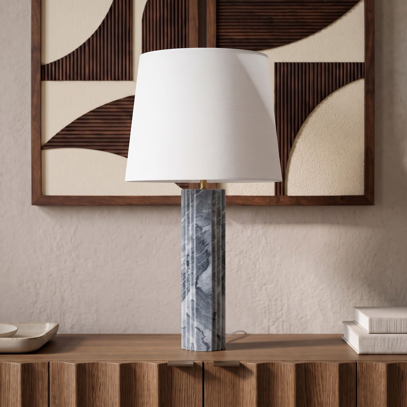 Table lamp with white fabric shade and blue-gray marbled base