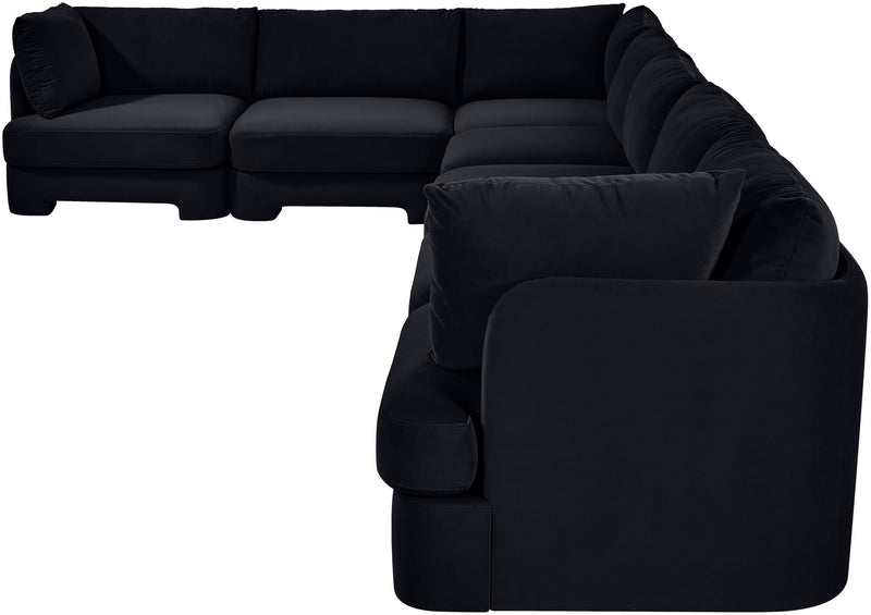 Black velvet performance fabric sectional sofa with rounded chaise and thick cushions