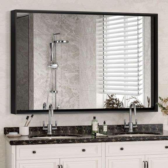 Black rectangular wall mirror with slim metal frame and reflective glass, wall-mounted