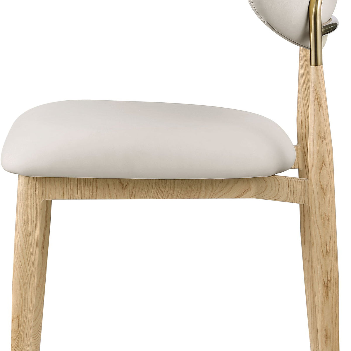 Light neutral upholstered dining side chair close-up with light wood legs