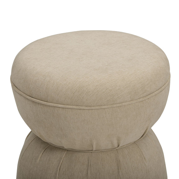 Beige ruched upholstered ottoman with round padded top and stacked base