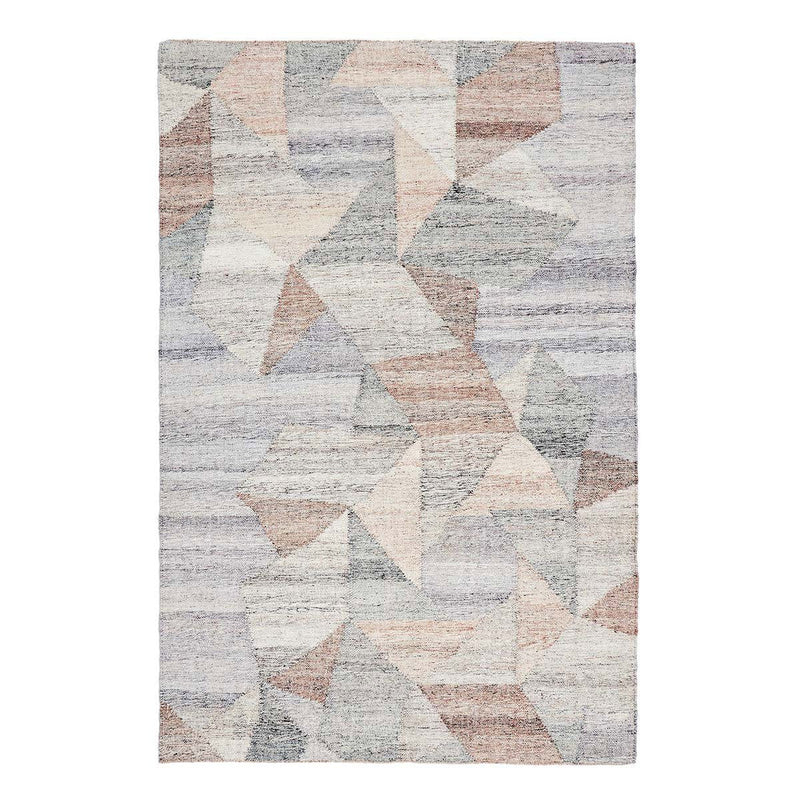 Rectangular geometric rug with distressed triangles and blocks in off-white, blue, and tan