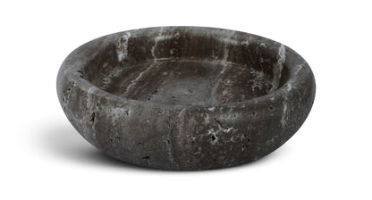Gray genuine travertine tray with shallow round basin, rough speckled texture.