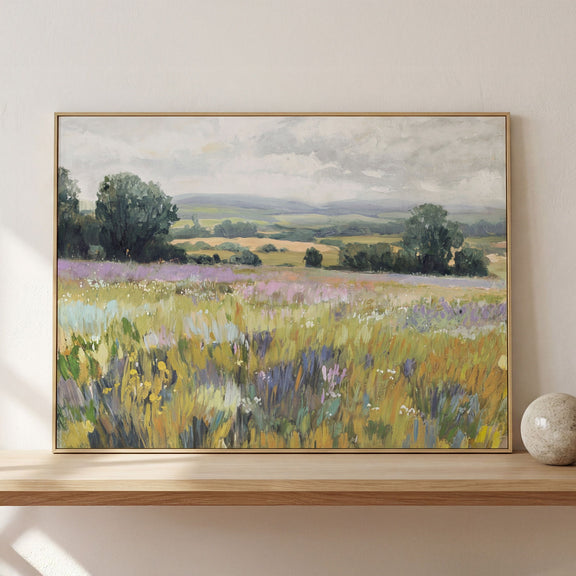 Framed landscape painting with purple and yellow wildflowers, trees, and distant hills