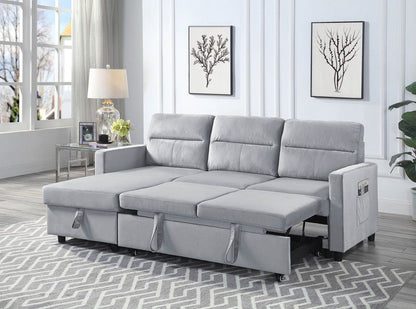Light gray reversible sectional sleeper sofa with storage chaise and side pocket armrest.
