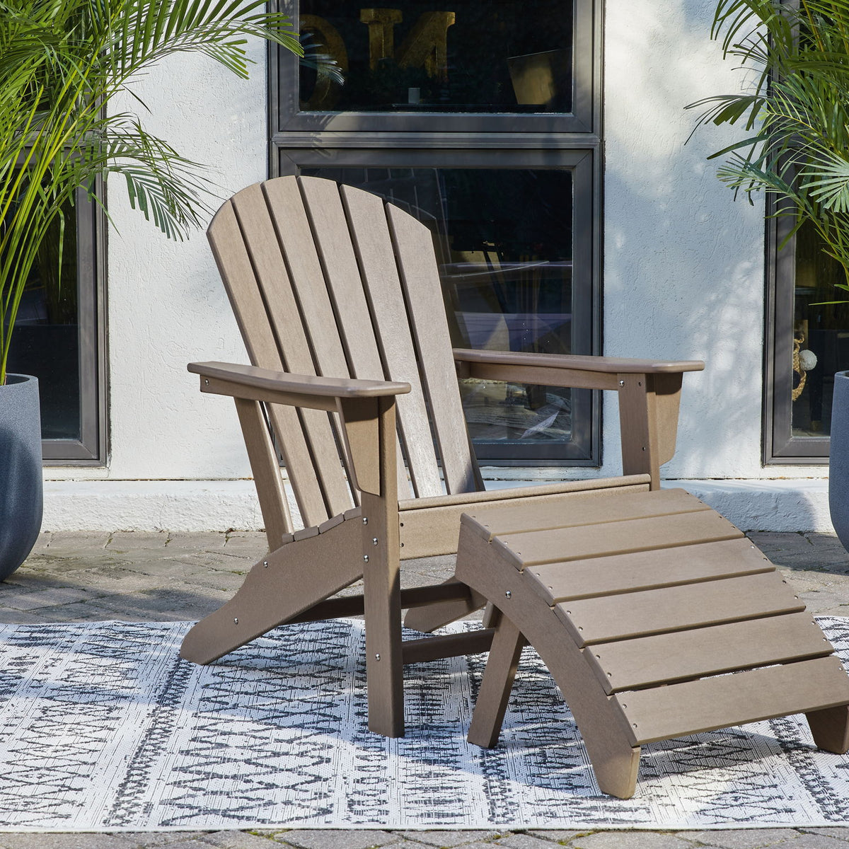 Adirondack chair and ottoman set in light driftwood with slatted back and seat