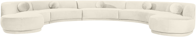 Light beige performance velvet sectional sofa viewed from the side with rounded seats