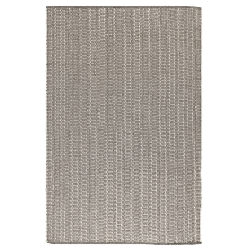 Pebble gray indoor/outdoor rug with flat woven texture and straight bound edges.