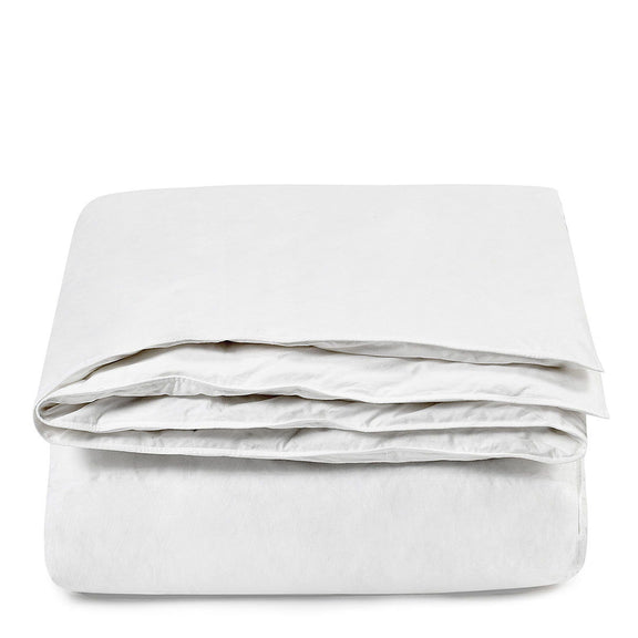 White goose down sham insert, neatly stacked folded bedding
