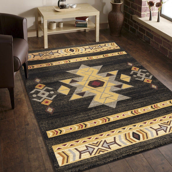 Southwest area rug with dark background, multicolor geometric banding and star shapes