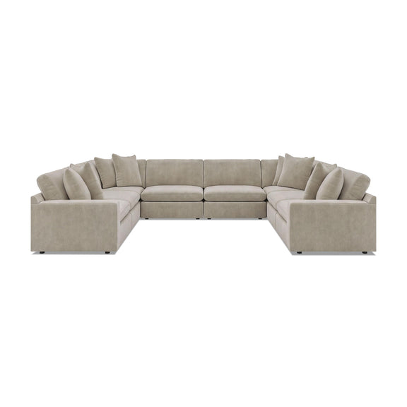 Beige 8-piece sectional sofa with rounded arms and multiple seat cushions.