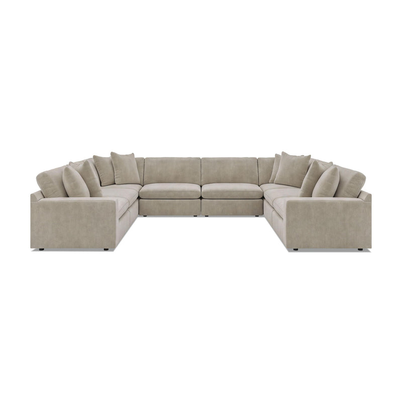 Beige 8-piece sectional sofa with rounded arms and multiple seat cushions.