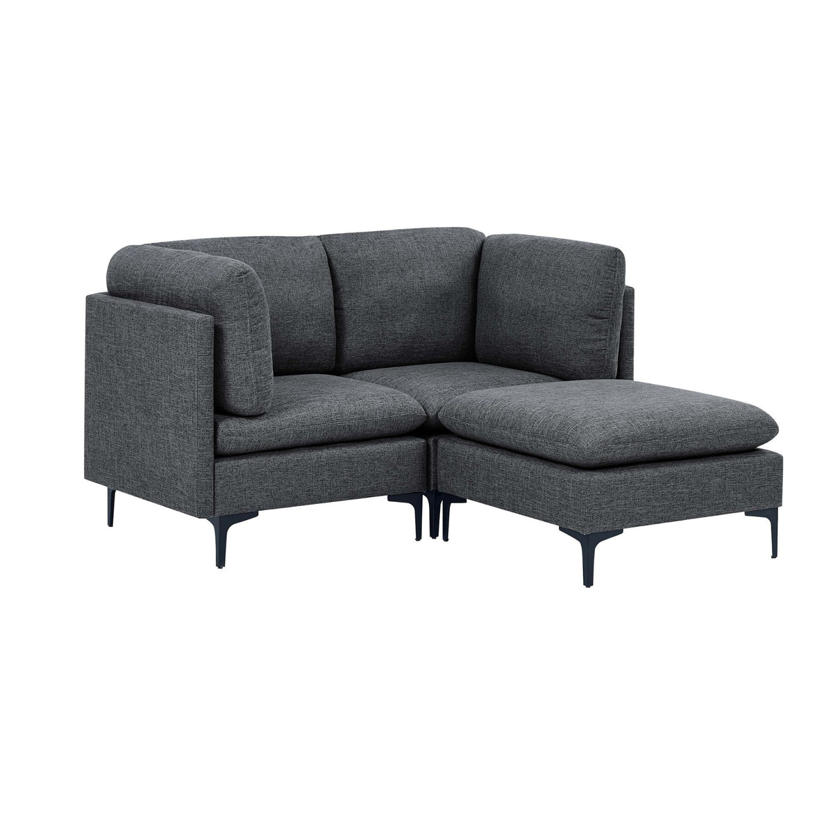 Dark gray upholstered sectional sofa with tall legs, L-shaped chaise and ottoman-style seats