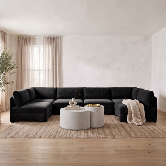 Black velvet armless U-shaped sectional sofa with corner and chaise-like end