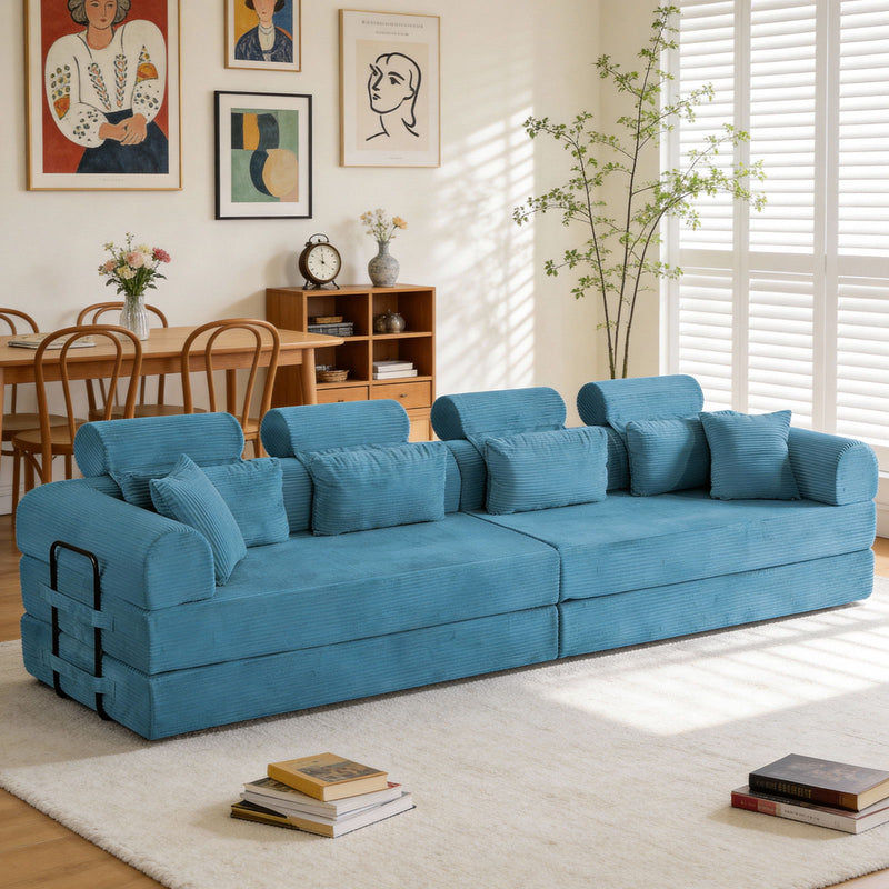 L-shaped sectional sofa in bright blue fabric with tufted arm panels and throw pillows