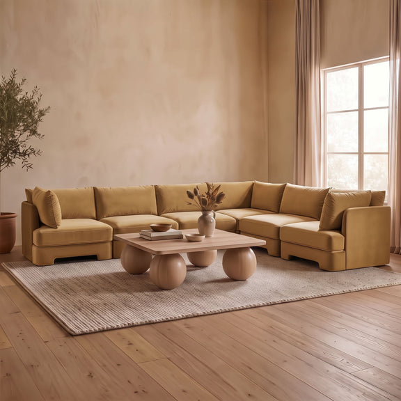 Beige velvet corner sectional sofa with multiple modular seats and low back cushions