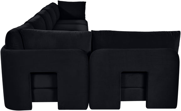 Black velvet armless sectional sofa with square back cushions and ottoman seats