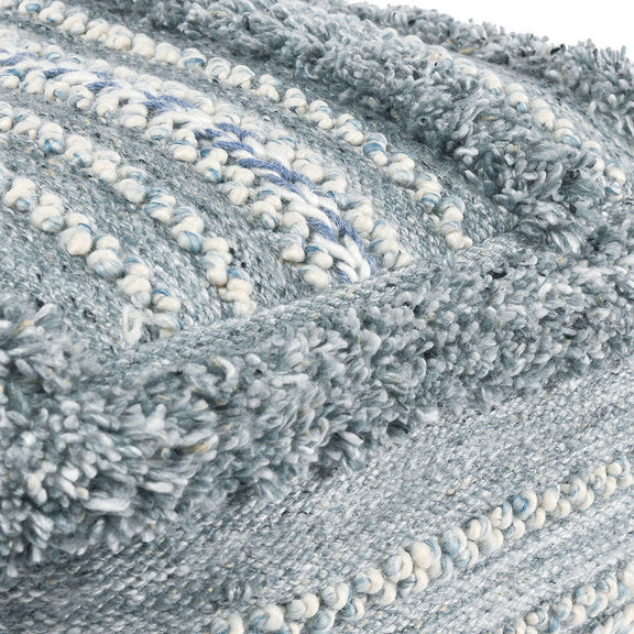 Blue and cream textured boucle-style pouf upholstery with looped fabric