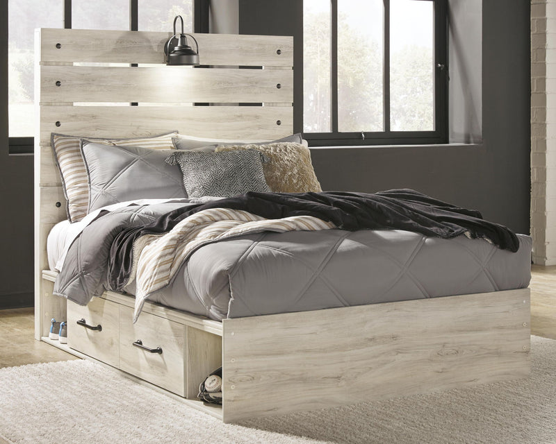 Cambeck panel bed with light wood headboard panels and two front drawer compartments