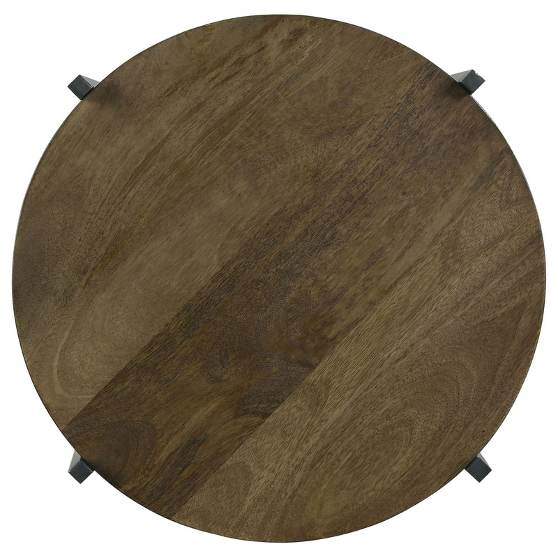 Round tabletop and bottom shelf of brown accent table with X-frame legs