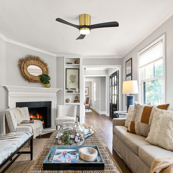 Gold and black ceiling fan with frosted LED light mounted on ceiling