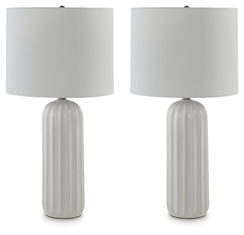 Set of 2 white ceramic table lamps with ribbed bases and white fabric shades.