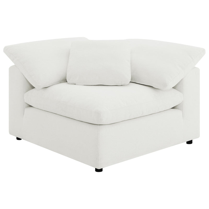 White modular ottoman section with padded armrests and thick seat cushion