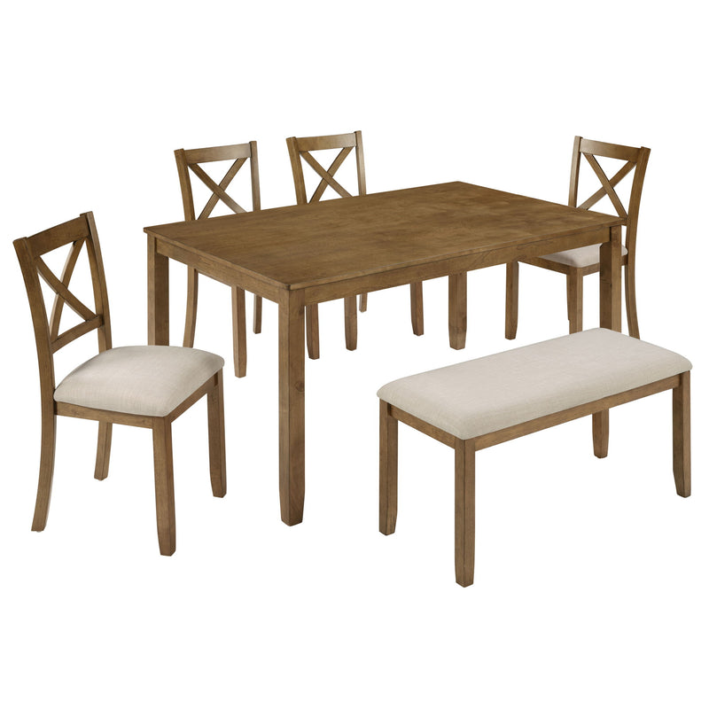 Rectangular dining table with four upholstered-seat cross-back dining chairs.