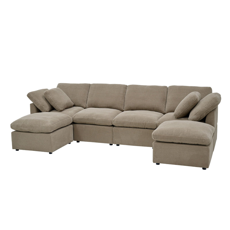 Light brown modular sectional sofa with two chaise ends and loose cushions