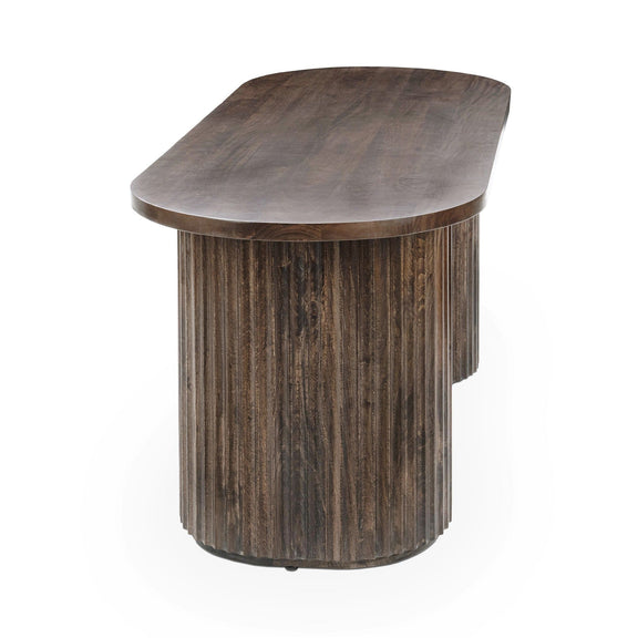 Brown wood desk with rounded oval tabletop and single central pedestal base