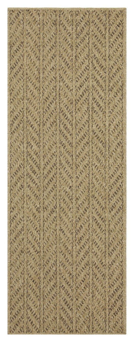 Rectangular light brown area rug with repeating chevron pattern, narrow view