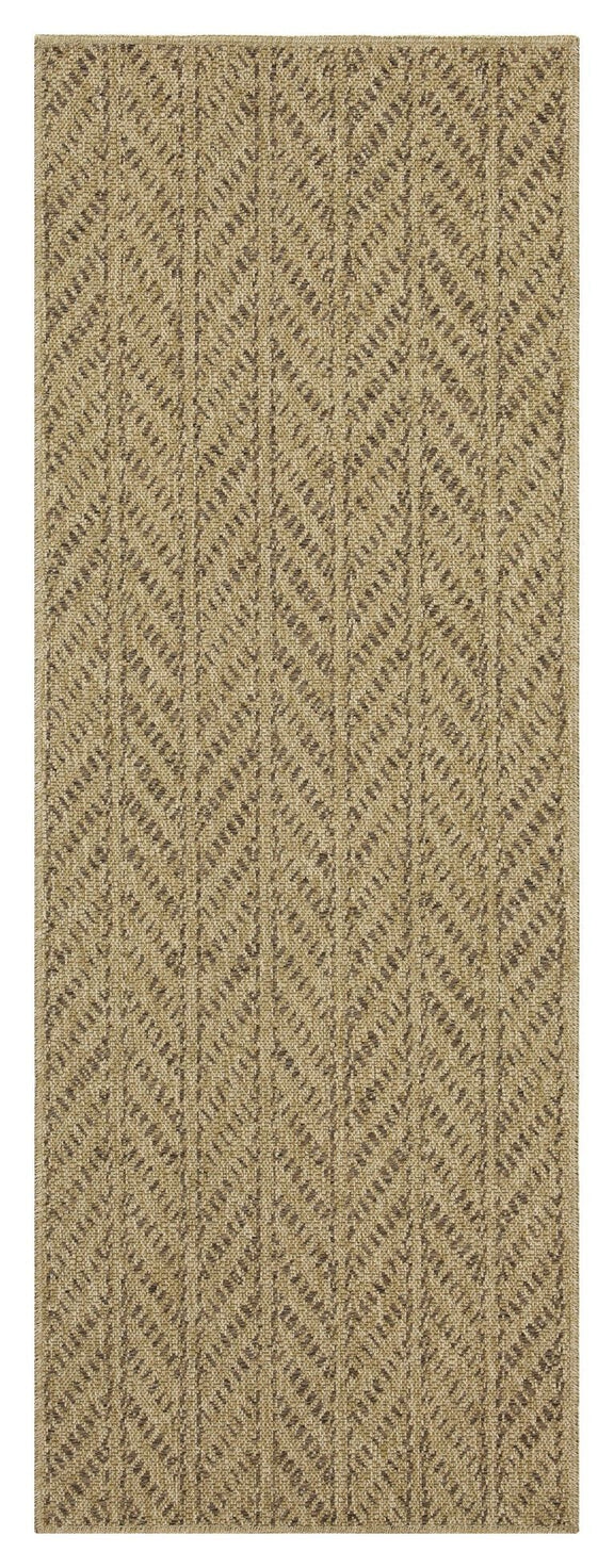Rectangular light brown area rug with repeating chevron pattern, narrow view