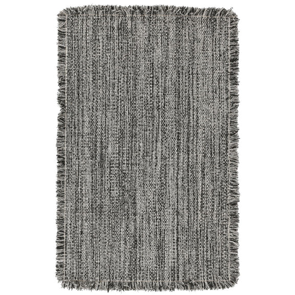 Charcoal gray wool rug with short fringe and tightly woven flat texture.