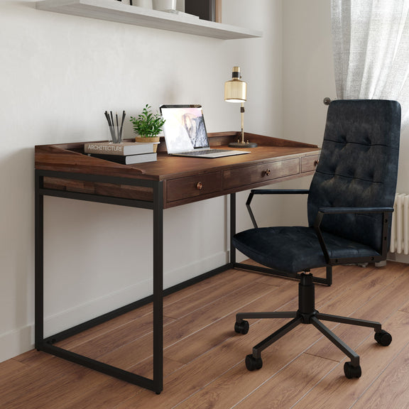 Swivel office chair with dark distressed blue upholstery, padded arms, and rolling base