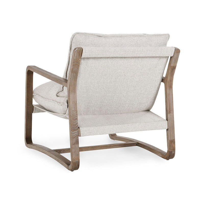 Natural wood accent chair with wide arms and light beige upholstered seat and back