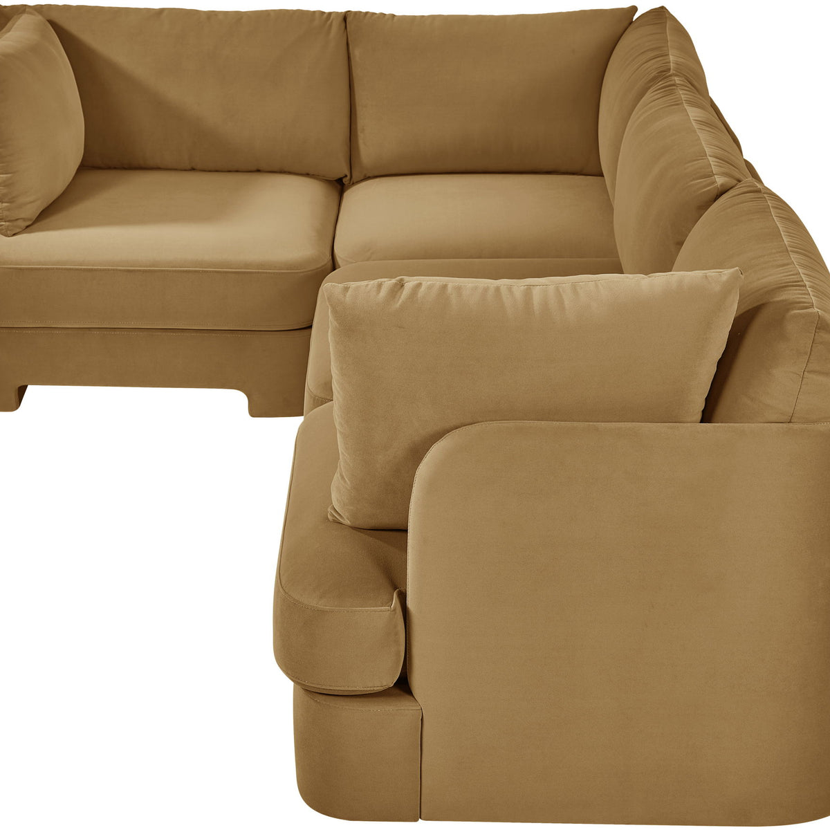 Brown velvet sectional sofa with padded armrests and matching chaise corner cushions