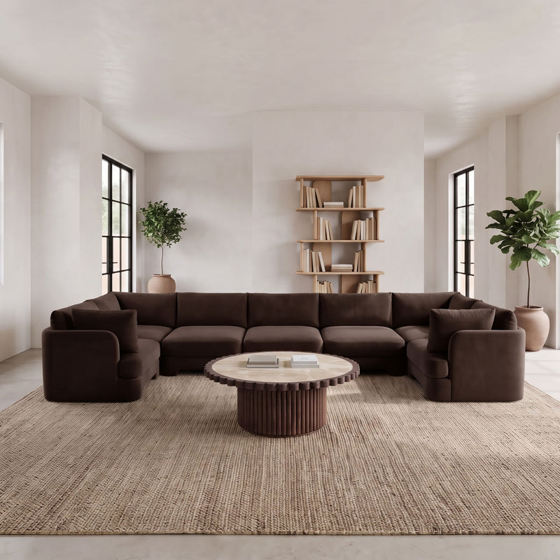 Dark brown U-shaped sectional sofa with thick armrests and cushioned seats