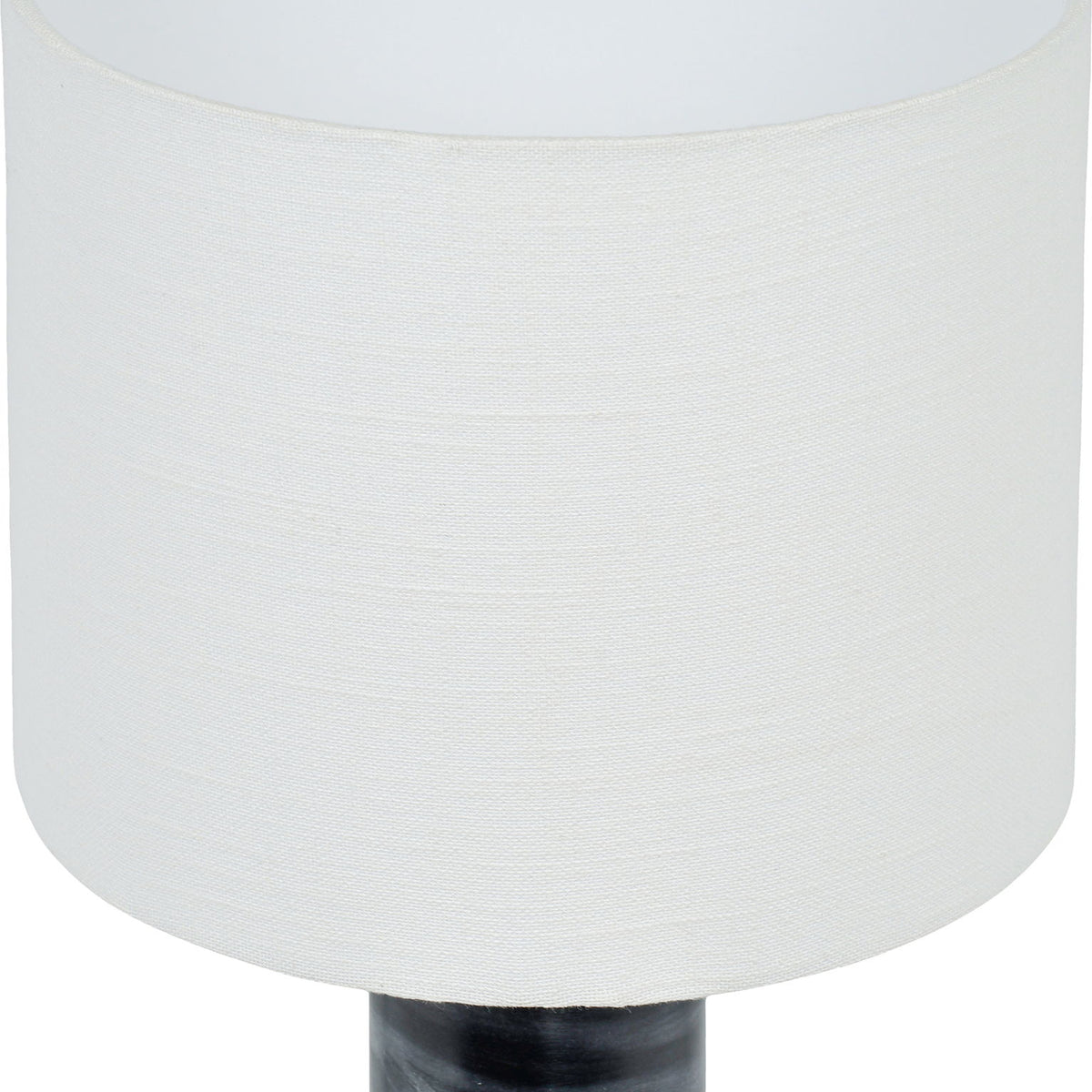 Textured fabric table lamp with white drum shade and dark gray cylindrical base
