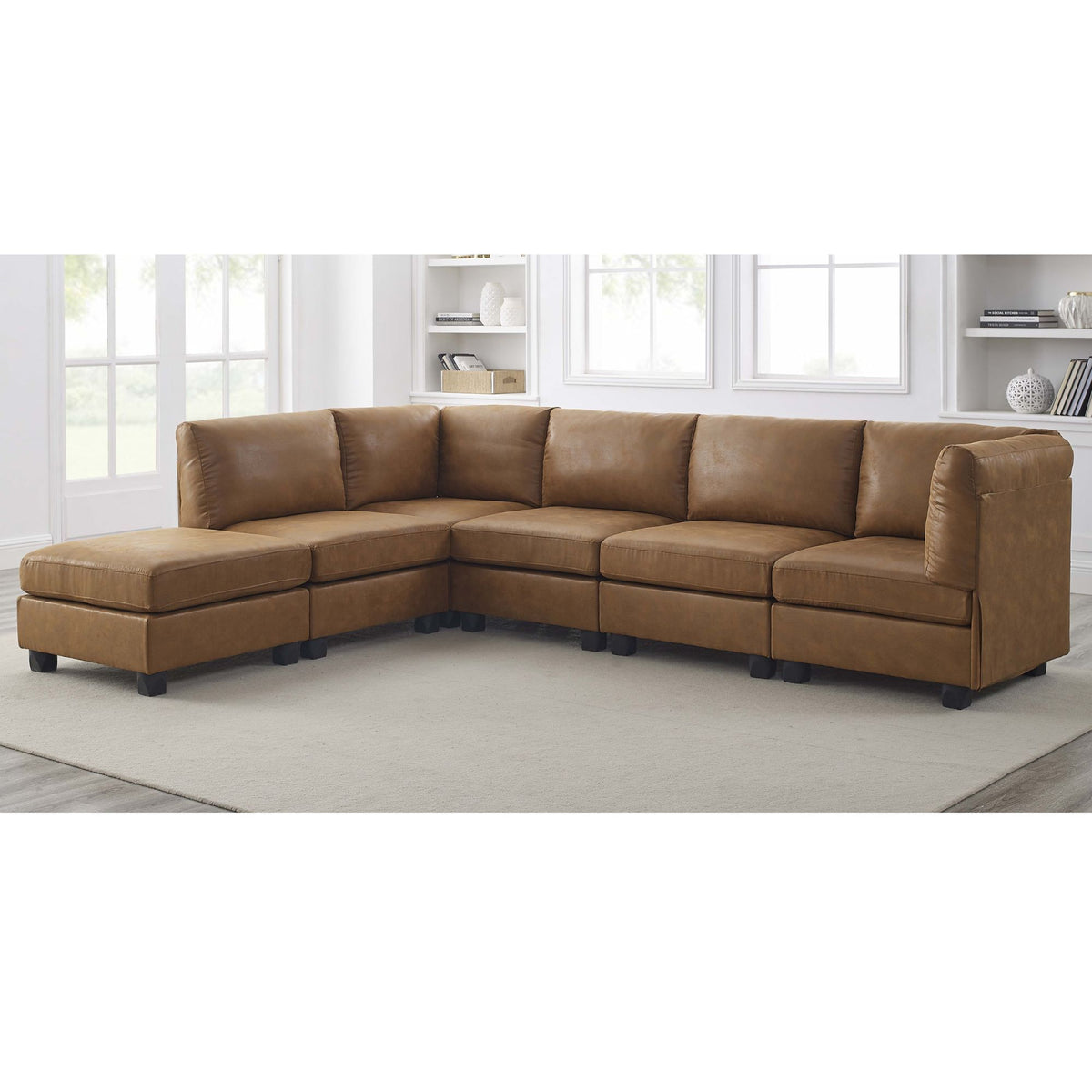 Brown sectional sofa with left chaise, tufted seat cushions, and square arms.