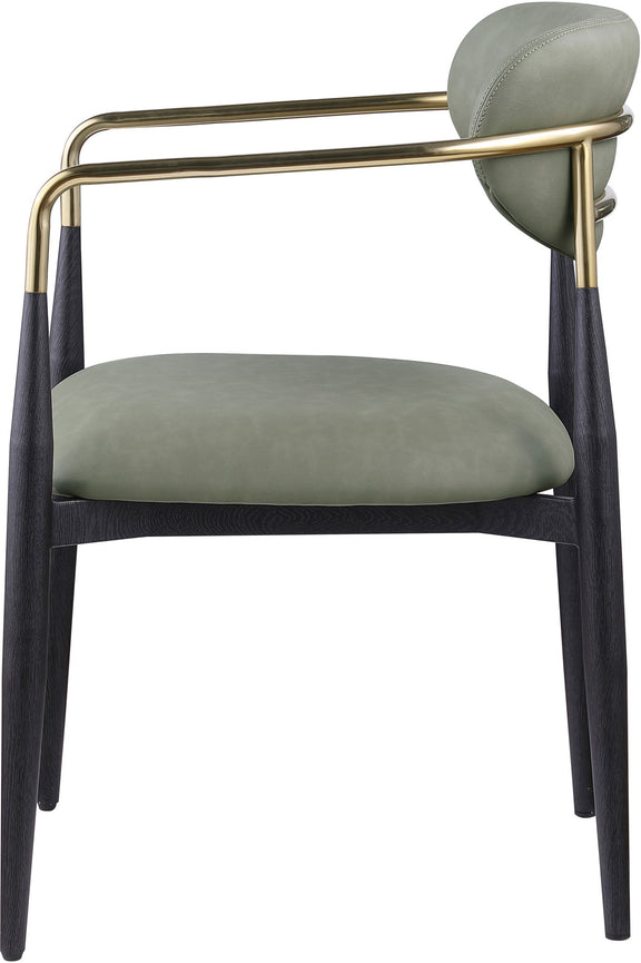 Upholstered dining arm chair with light sage seat and back, black legs, gold arm frame