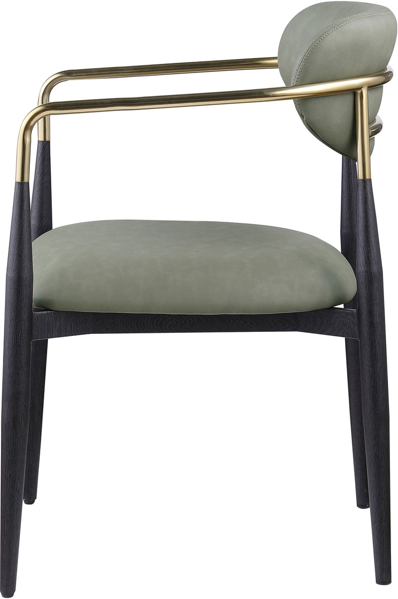 Upholstered dining arm chair with light sage seat and back, black legs, gold arm frame